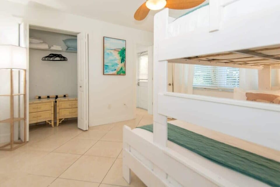 Plenty of space for the entire family. Our second bedroom features another ensuite bathroom and 3 beds. 
 #KidsRoomInspo #BunkBedDreams #BedroomGoals