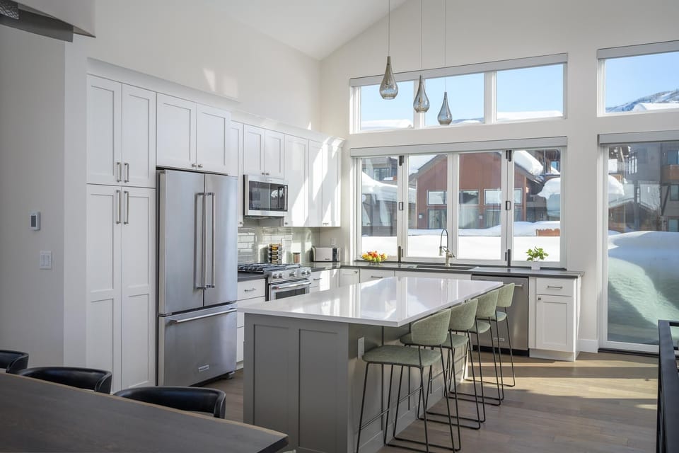 Seating for four at the breakfast bar/kitchen island