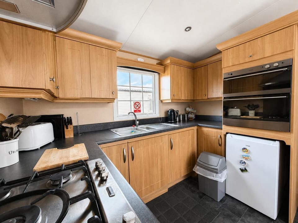 For UK family holidays or last minute weekend getaways, Parkdean Resorts Naze Marine Holiday Park Essex offers the perfect base, complete with a comfortable kitchen area in a caravan for added convenience.