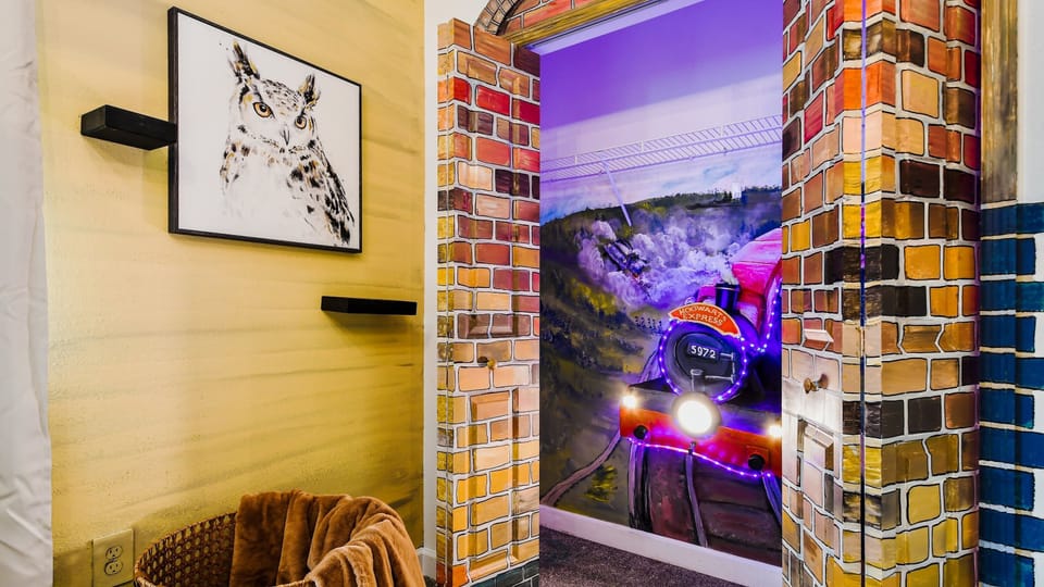 Unwind in our cozy Harry Potter inspired room with three beds, providing you with a peaceful retreat and a restful night's sleep during your stay.