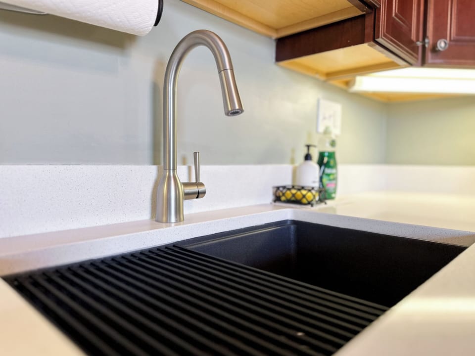 Our sleek and modern sink makes it easy to clean up after a great meal.