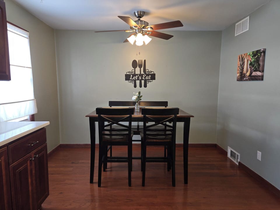 We have a dining table and seating for 4. Perfect for family meal time.