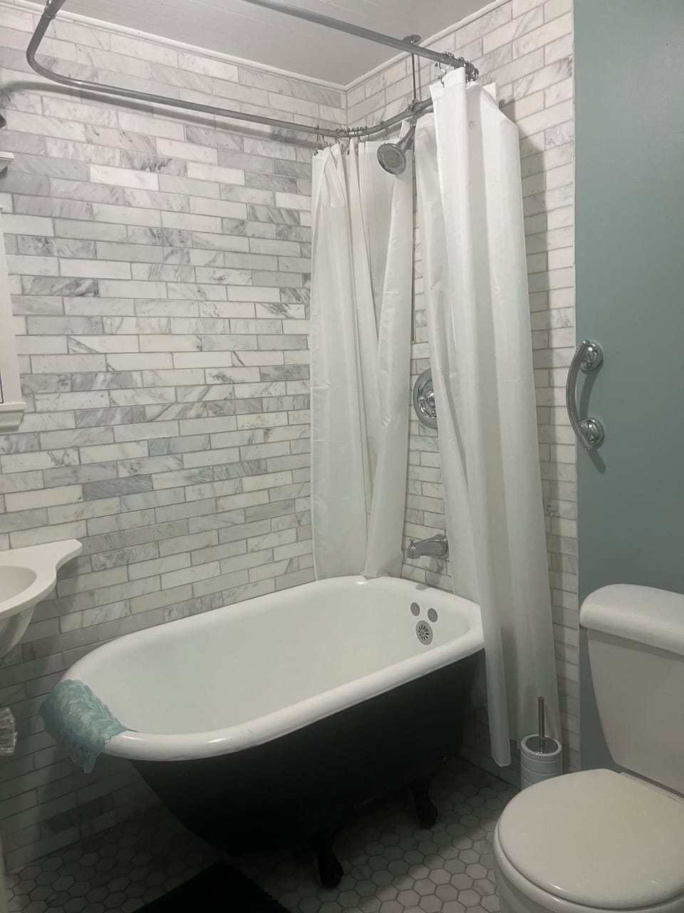 Small but elegant bathroom, vintage clawfoot tub, renovated 2017