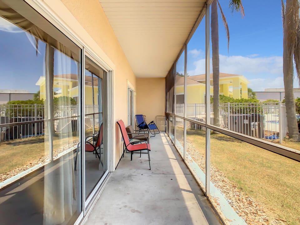 screened patio with access from master bedroom and living room