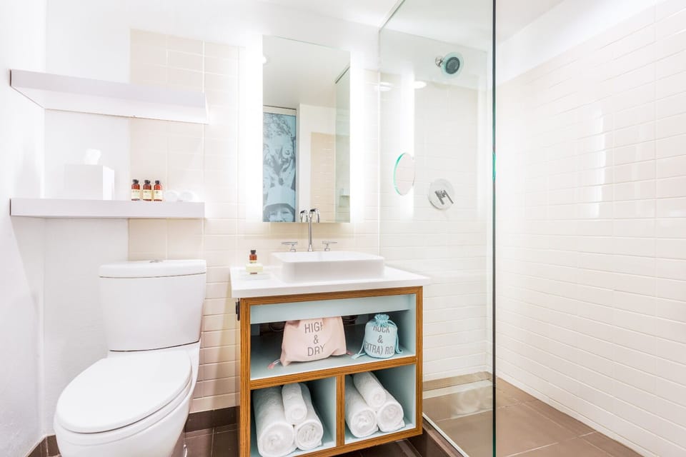 Start the morning with bright vanity space and fresh towels.