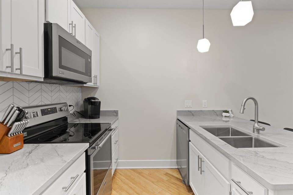 Spacious kitchen allows more than enough movement to perform any recipe procedures. 