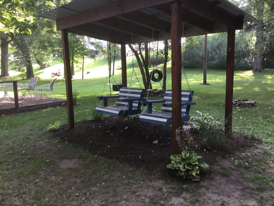 River swings and back yard.