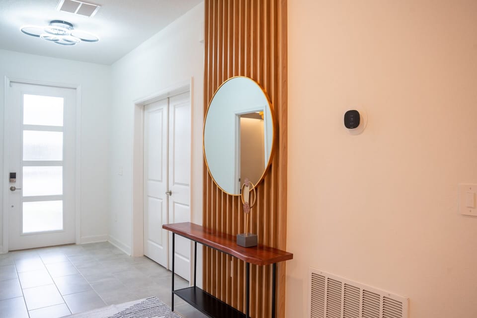 You will be welcomed by our Scandinavian-inspired foyer! This listing features a clean and minimalist decor! 
