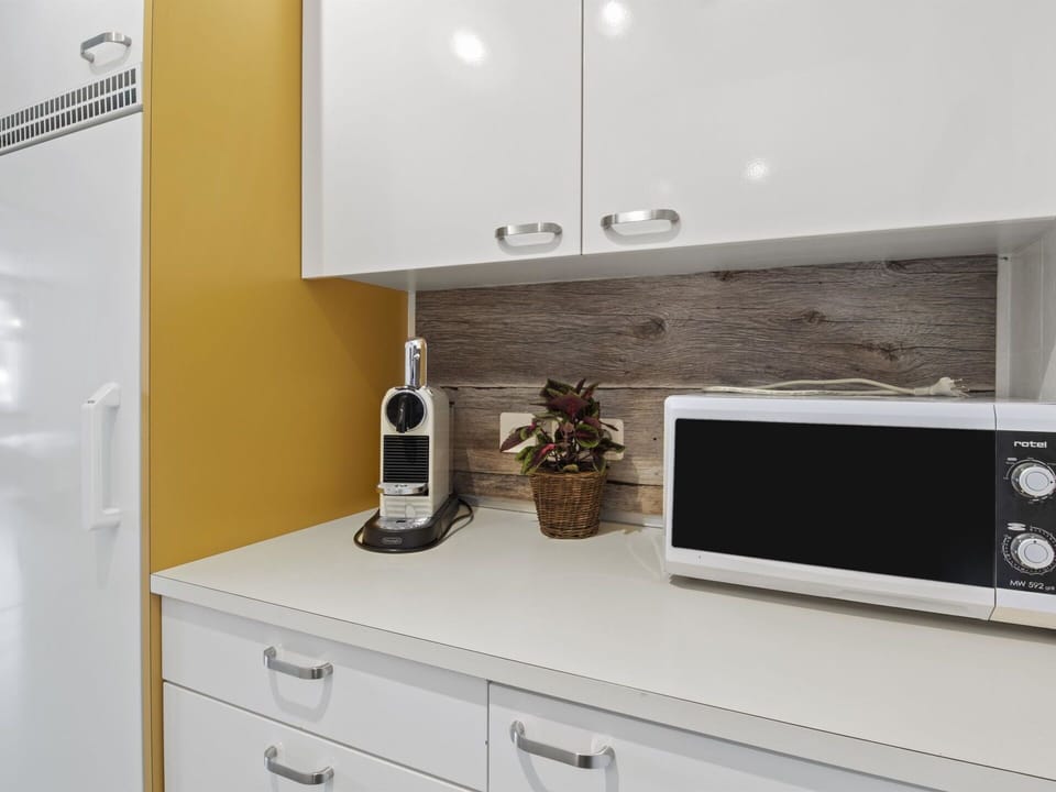 Cabinetry, Property, Furniture, White, Countertop, Kitchen Appliance, Kitchen, Home Appliance, Lighting, Shelving