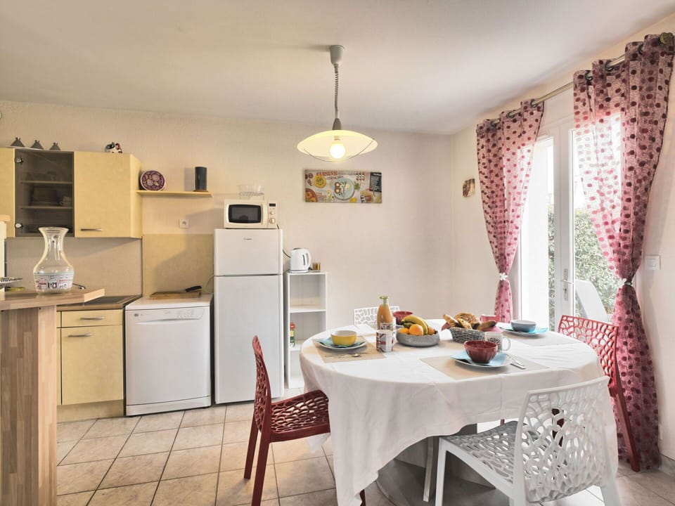 Property, Cabinetry, Furniture, Table, Countertop, Kitchen Appliance, Interior Design, Curtain, Wood, Kitchen Stove