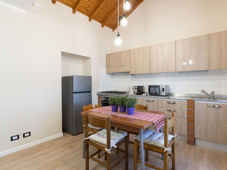 Cabinetry, Property, Furniture, Countertop, Kitchen Sink, Wood, Kitchen Stove, Interior Design, Kitchen Appliance, Flooring