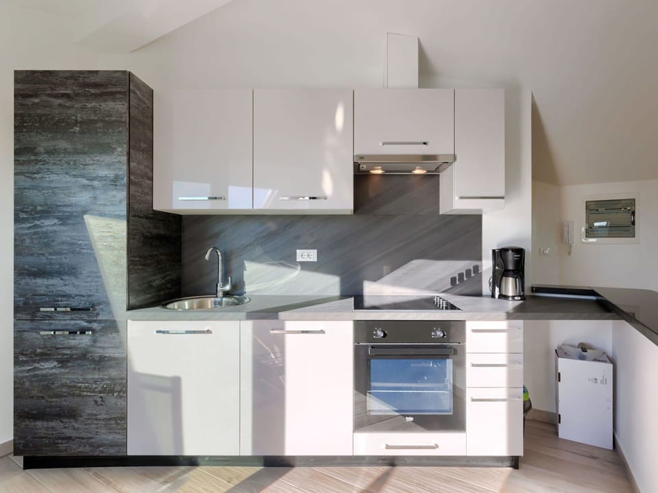 Cabinetry, Countertop, Property, Building, Kitchen Appliance, Kitchen Stove, Kitchen, Sink, Home Appliance, Wood