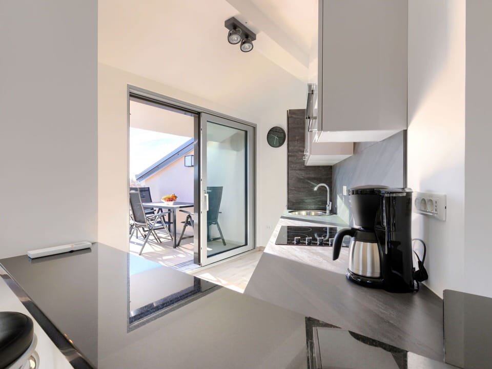 Property, Lighting, Interior Design, Wood, Building, Floor, Flooring, Cabinetry, Hall