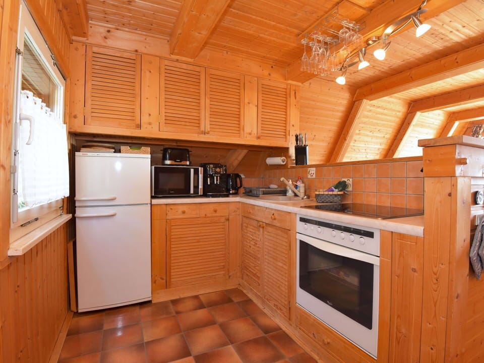 Cabinetry, Countertop, Furniture, Kitchen Appliance, Kitchen, Kitchen Stove, Wood, Home Appliance, Interior Design, Microwave Oven