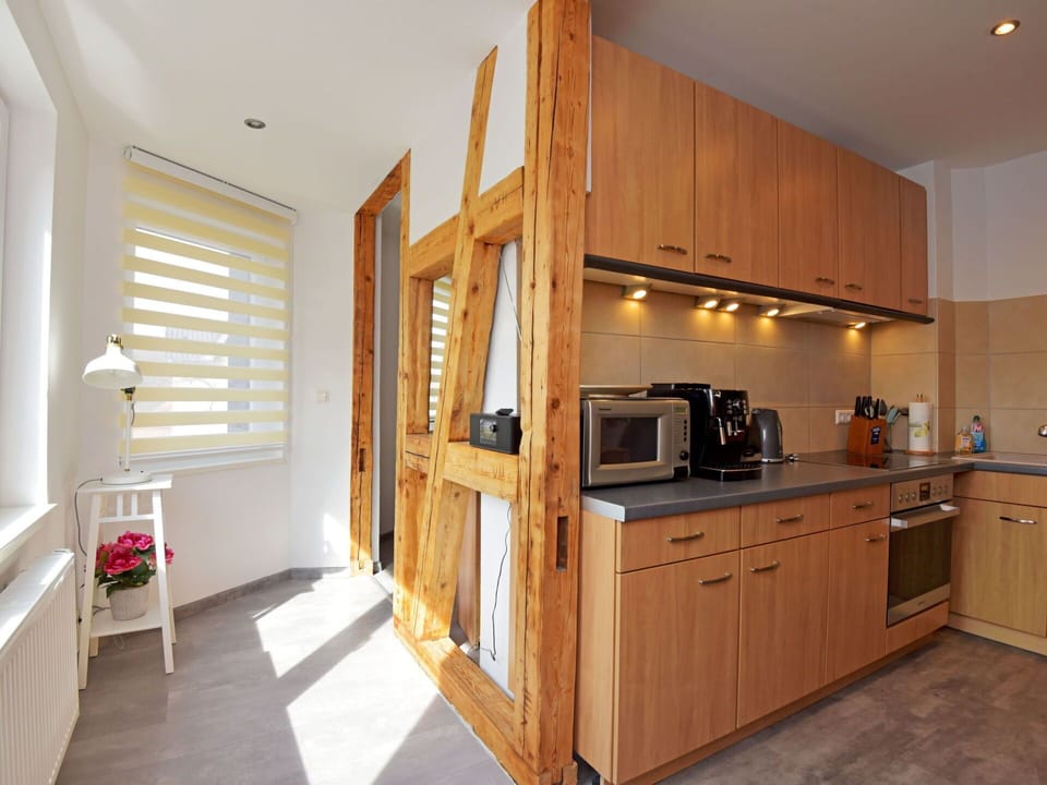Cabinetry, Countertop, Building, Kitchen Appliance, Kitchen, Wood, Kitchen Stove, Sink, Wood Stain, Home Appliance