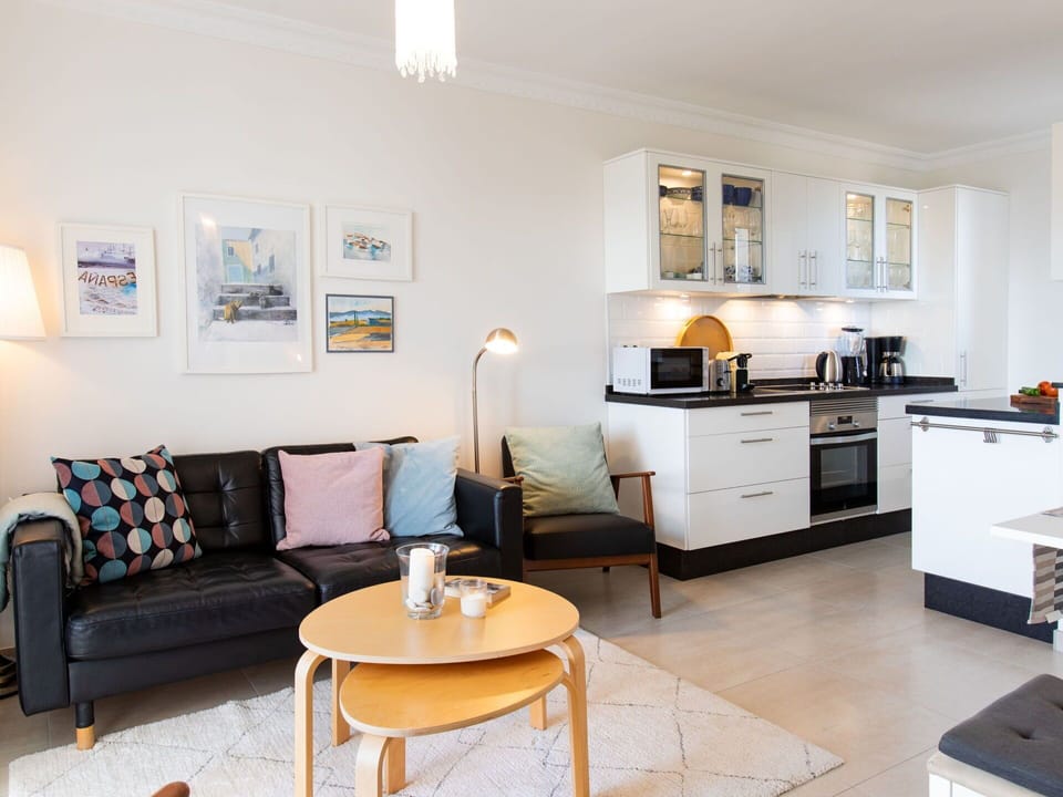 Furniture, Property, Cabinetry, Table, Countertop, Lighting, Interior Design, Couch, Flooring, Floor