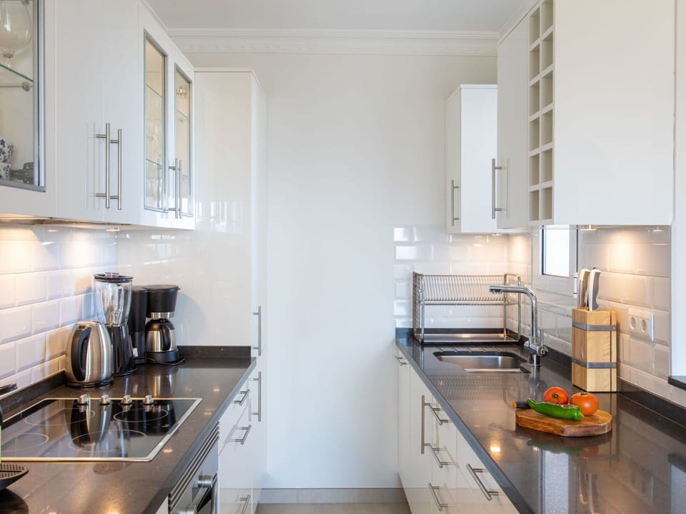 Kitchen Sink, Sink, Countertop, Cabinetry, Kitchen, Tap, Kitchen Appliance, Kitchen Stove, Interior Design, Wood
