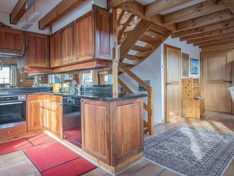 Cabinetry, Property, Furniture, Wood, Countertop, Lighting, Interior Design, Wood Stain, Building, Flooring