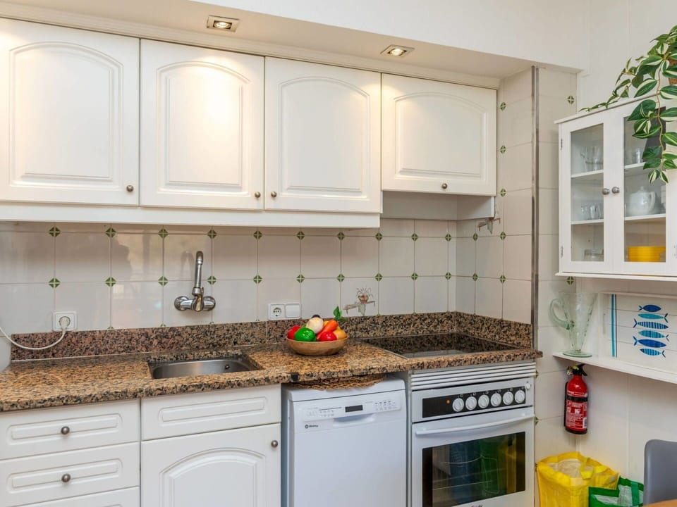 Kitchen, Countertop, Kitchen Appliance, Cabinetry, Major Appliance, Interior Design, Wood, Furniture, Sink, Kitchen Sink