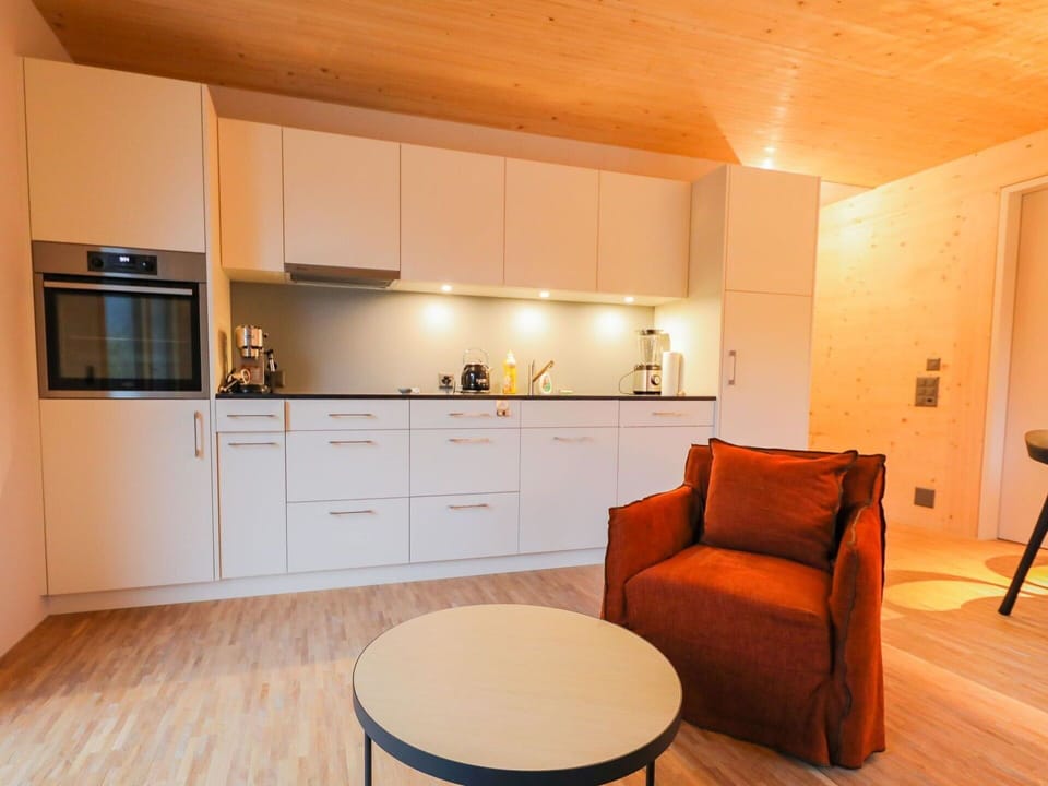 Furniture, Cabinetry, Property, Countertop, Wood, Lighting, Flooring, Interior Design, Floor, Building