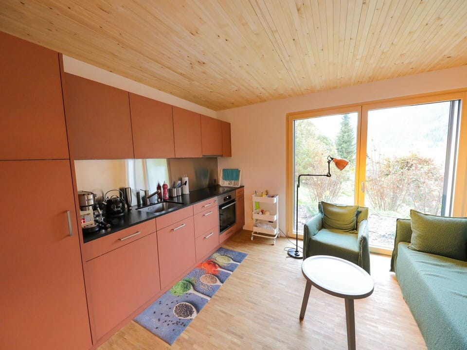 Furniture, Cabinetry, Chair, Wood, Orange, Flooring, Interior Design, Floor, Countertop, Comfort
