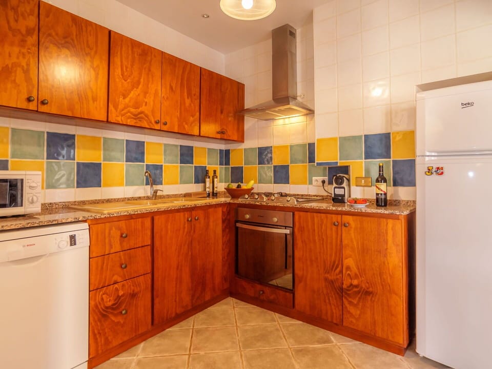 Cabinetry, Countertop, Furniture, Kitchen Appliance, Sink, Building, Kitchen Stove, Tap, Kitchen, Wood