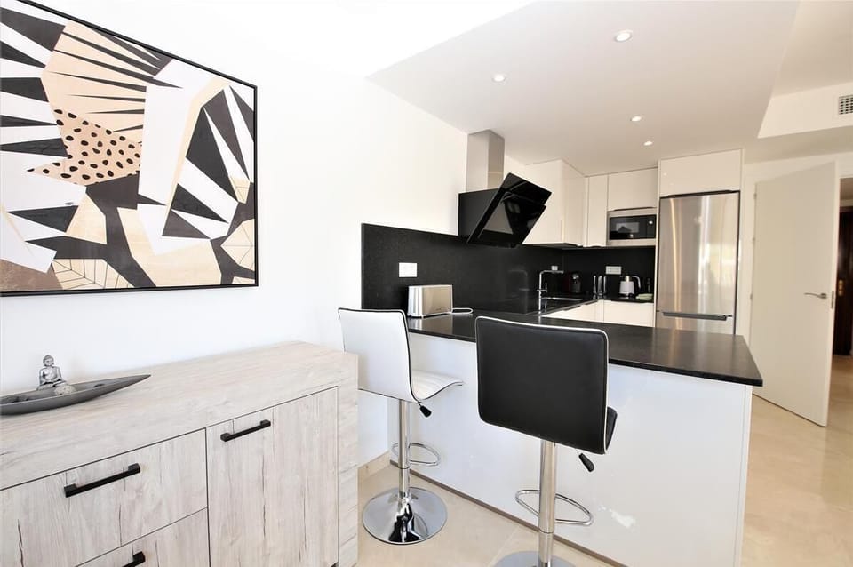 View of the kitchen from the breakfast bar for two guests
