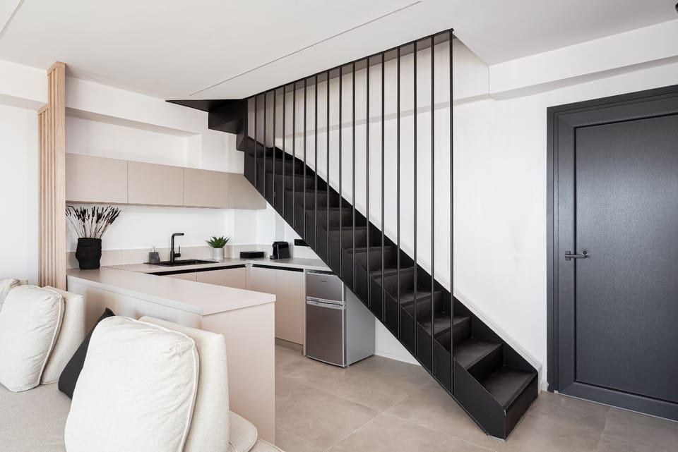 Fully Equipped Kitchen And Interior Staircase 