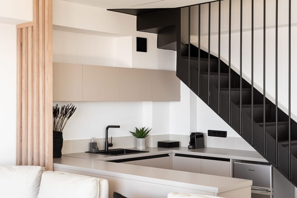 Interior Staircase And Fully Equipped Kitchen