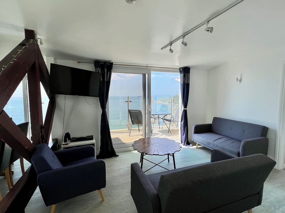 The Lounge, with the balcony in the background and stunning views