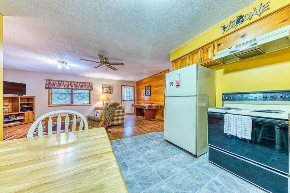 Floor, Indoors, Hardwood, Ceiling Fan, Refrigerator