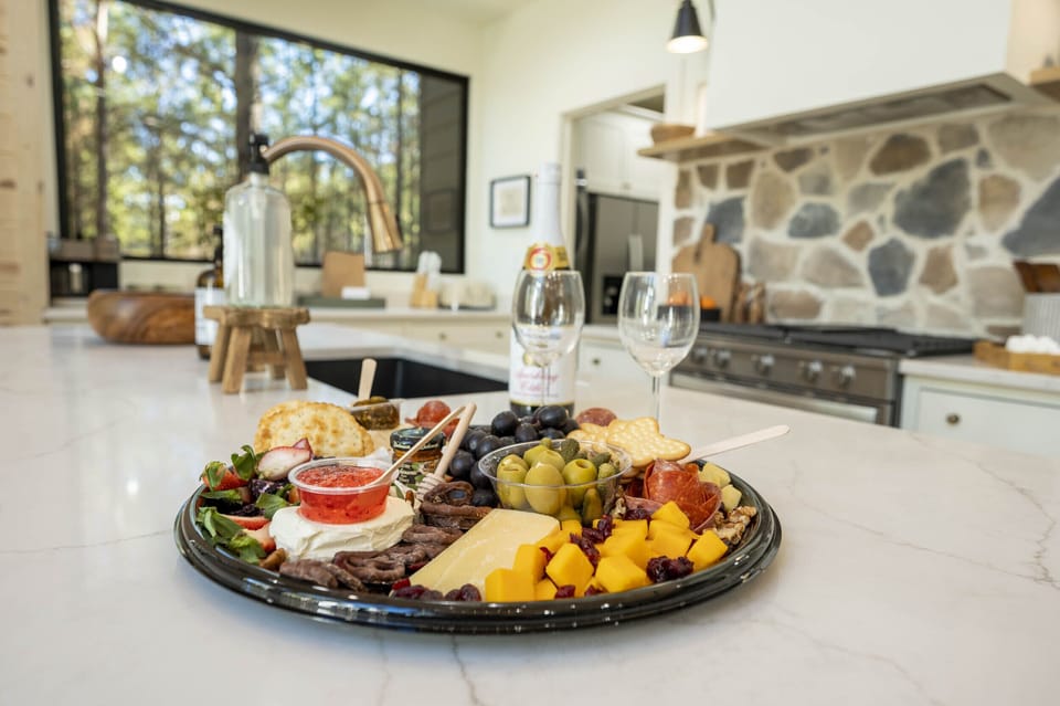 Enjoy a bottle of wine from one of the local wineries. You can also order a charcuterie tray to be delivered.