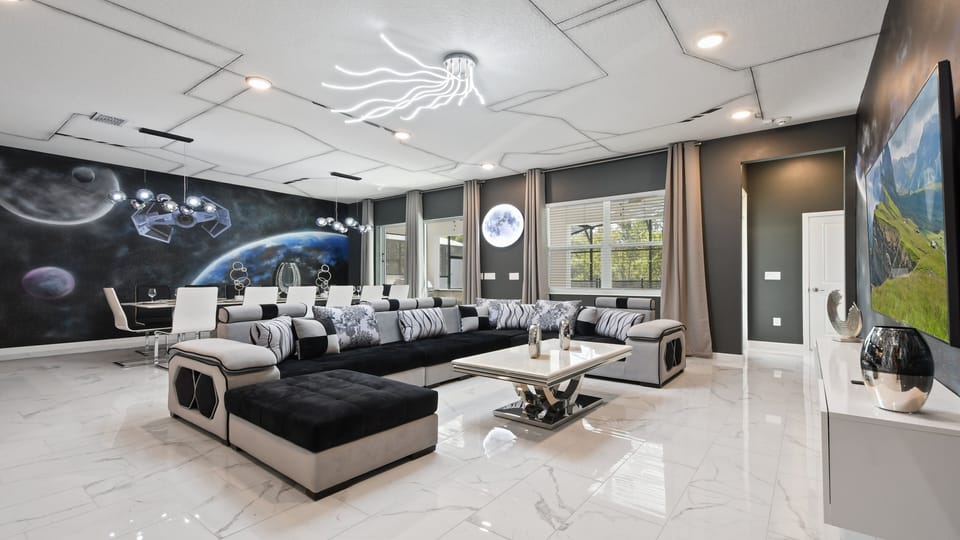 Enjoy quality time with loved ones in our inviting living room, offering a cozy space for relaxation.