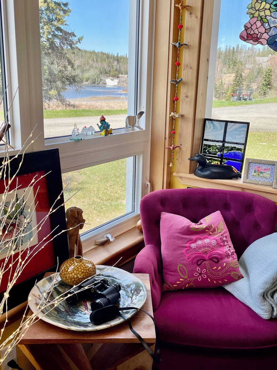 Living room with a view of the waterfall and bay.