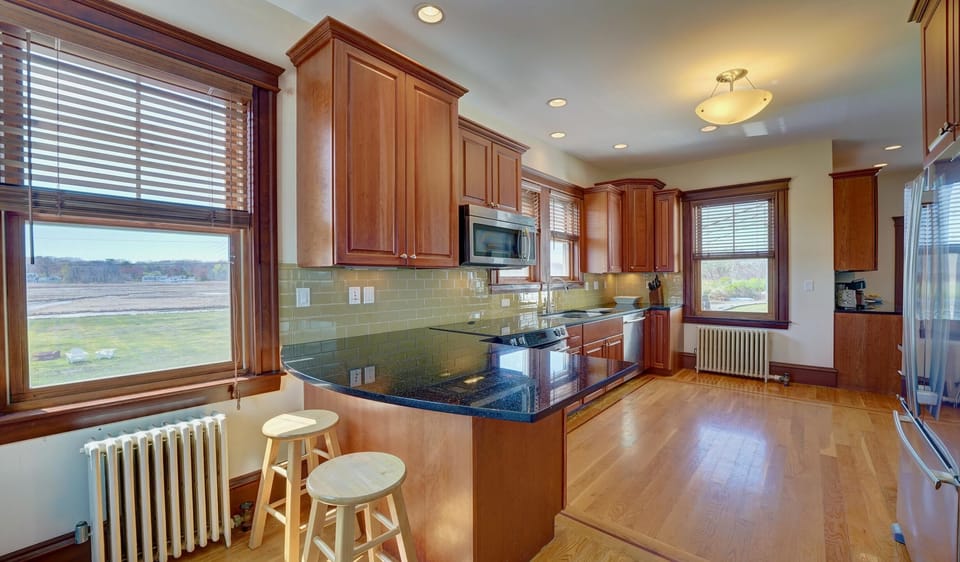 Spacious modern kitchen w/ beautiful views of the marsh