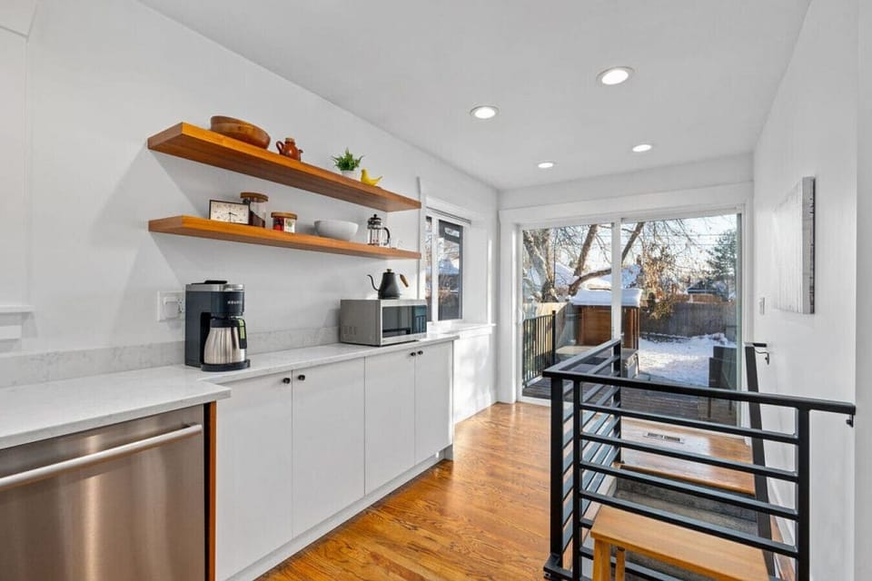 Access the backyard through the sliding glass doors and the basement down the stairs.
