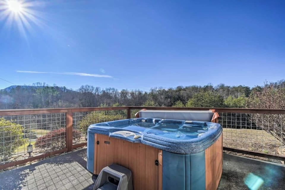 Enjoy stunning vistas from your private deck with a relaxing hot tub!