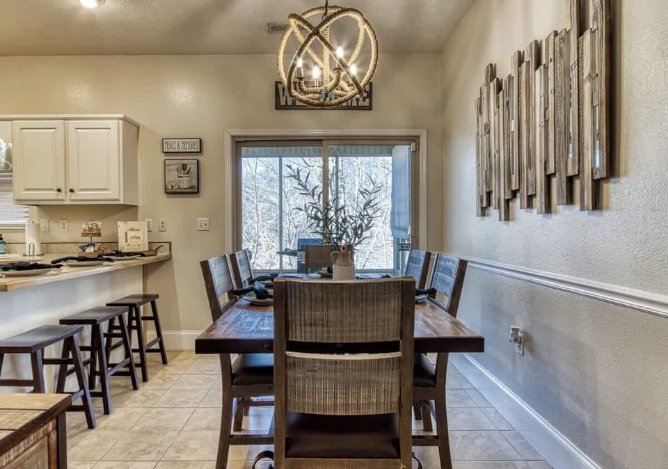 Gather around the rustic table with stunning views and charming decor!