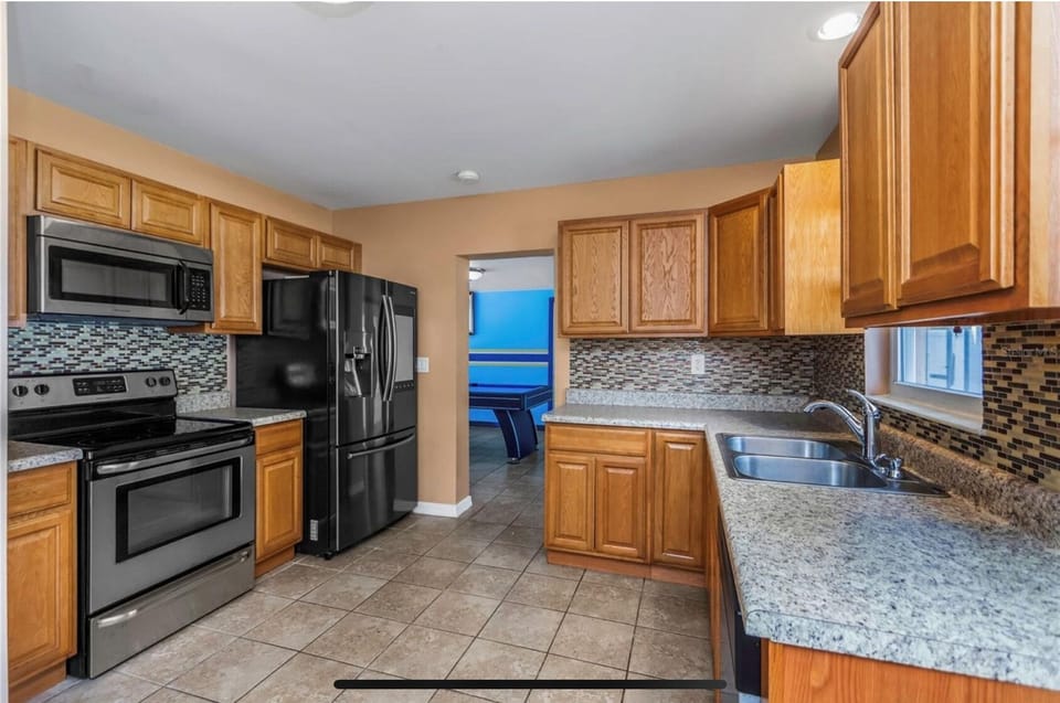 Kitchen with pool view
