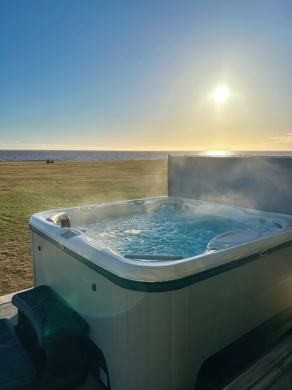 New hot tub with views of the ocean