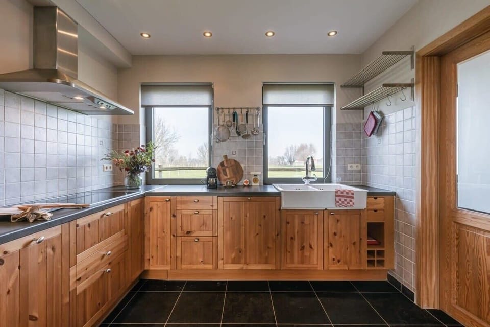 Fully equipped kitchen with garden view