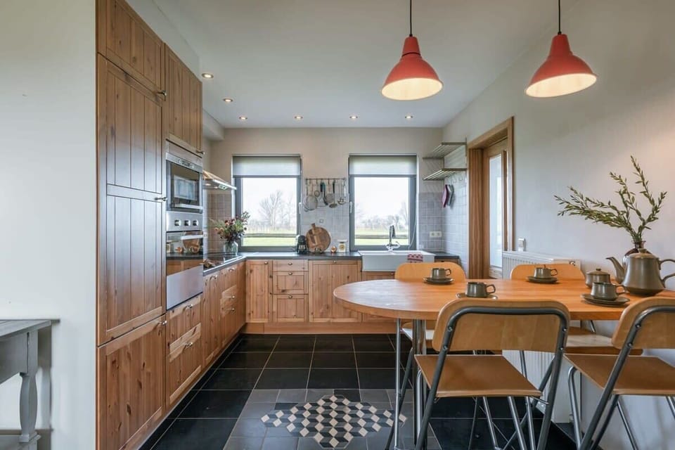 Fully equipped kitchen with garden view