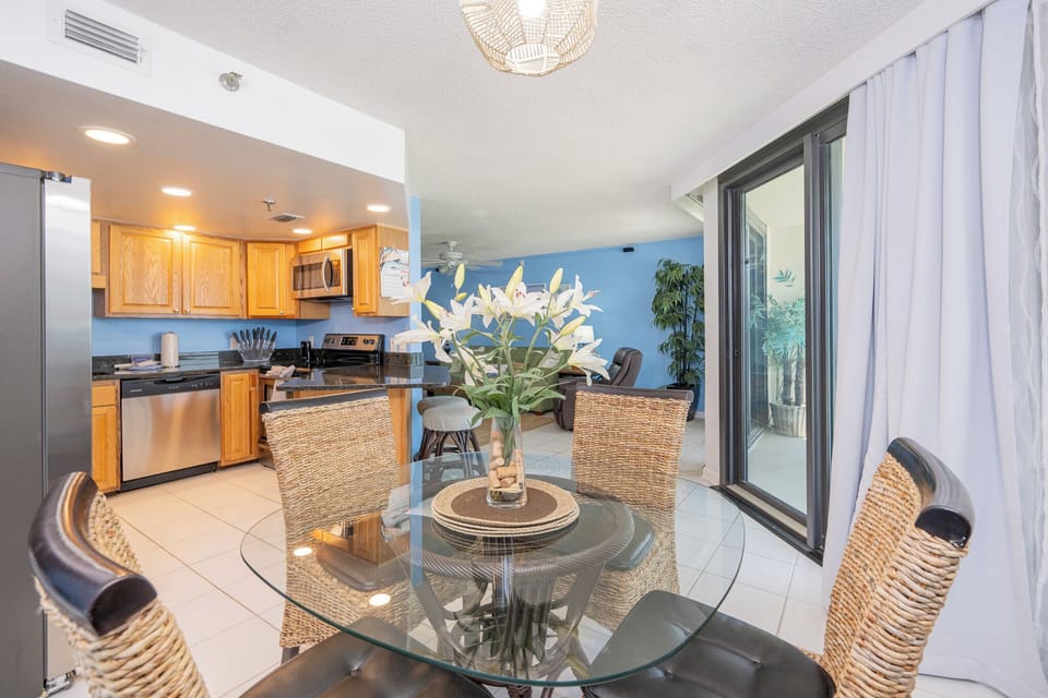 Cool coastal breeze drifts through your dining room as you plan a relaxing day on the shore