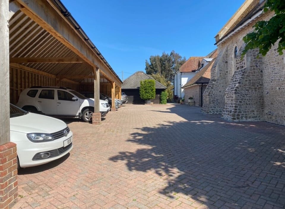 Undercover Oak carport within the grounds of Barton Manor