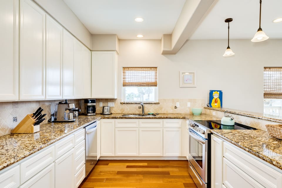 Plenty of counter prep space and cabinet storage