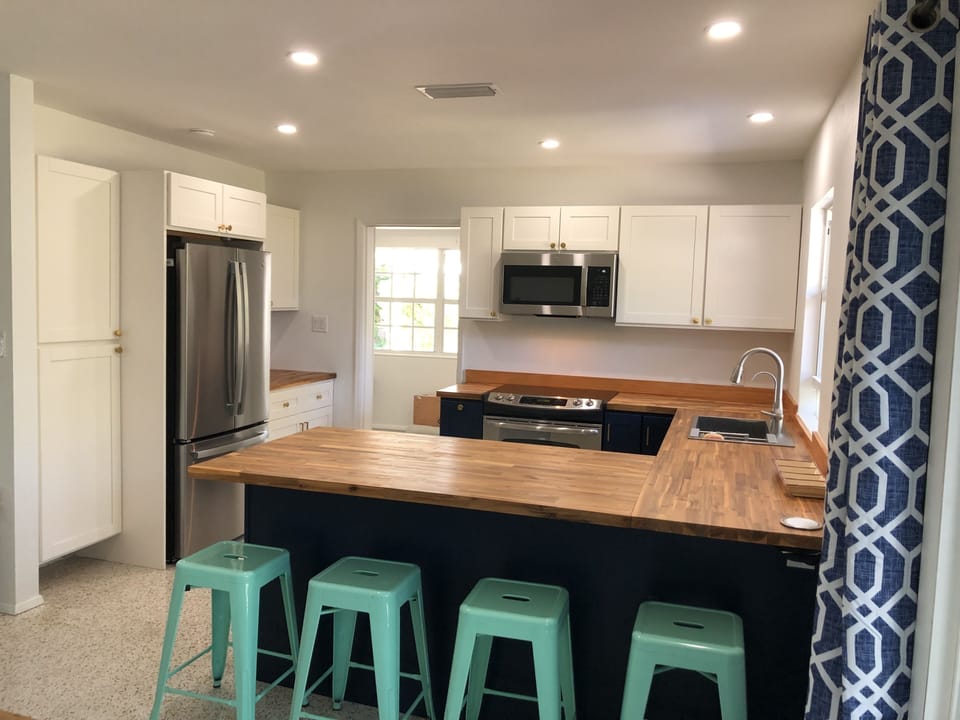 Kitchen looking into Exercise Room