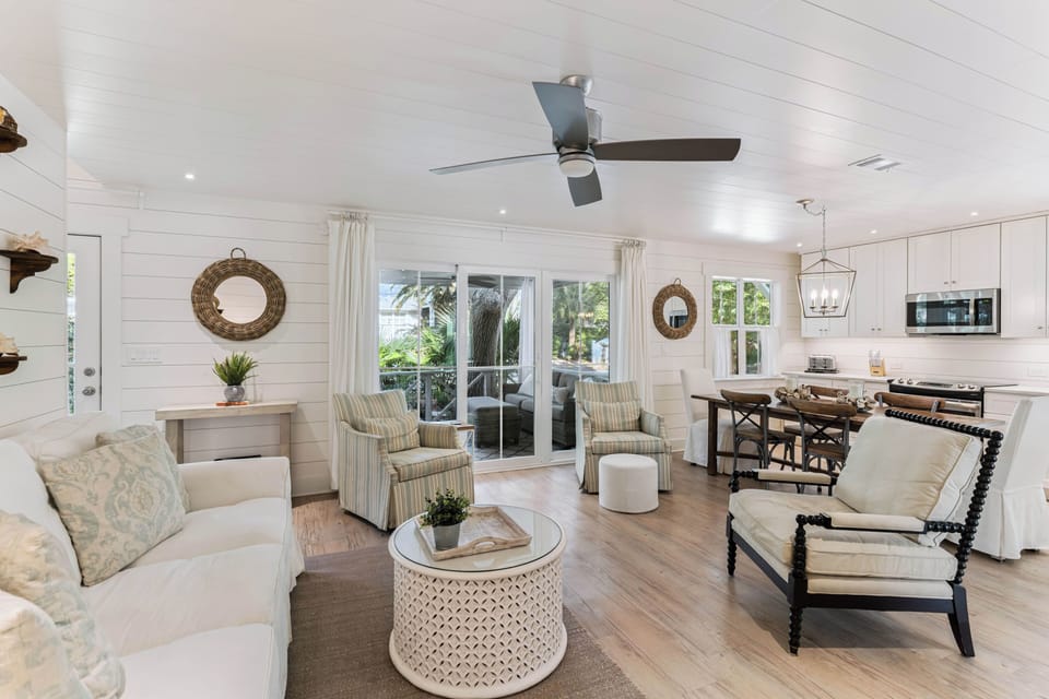 Relax in your bright, airy living space with coastal charm and modern comfort for perfect vacation moments.