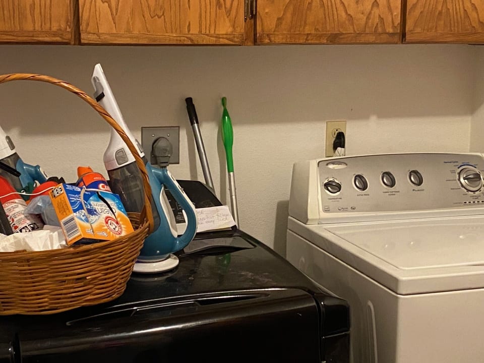 Laundry room with washer and dryer plus all the needed supplies (detergent, etc)