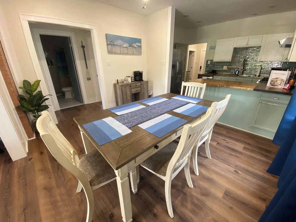 Enjoy your meals or playing games on the full-sized dining table. 