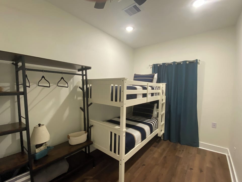 Bedroom 3: Fun and cozy bunk beds, perfect for the young at heart!